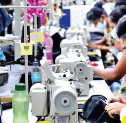 Manufacturers laud growth in index, but worried over high taxes