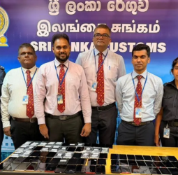 Three Chinese nationals arrested at BIA with 87 mobile phones
